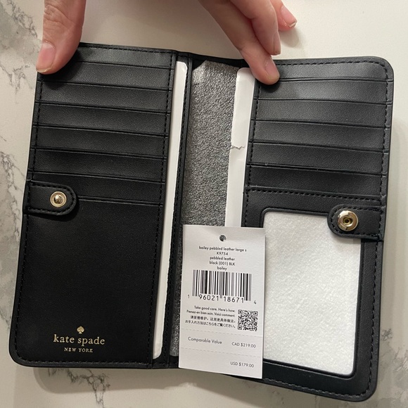 Kate spade ♠️ wallet black bailey flaw is on back of wallet new with tags - Picture 1 of 13